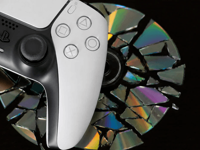 playstation-5-controller-on-top-of-broken-disc